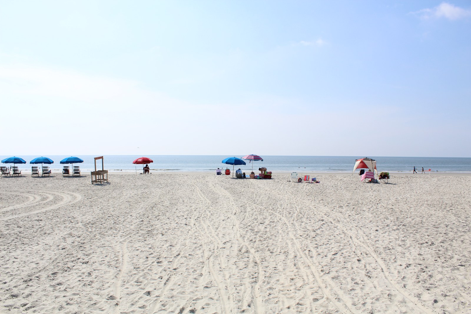 Archival 2017-07-20 shoreline photograph. Not evidence of today’s facilities, guards or water conditions.