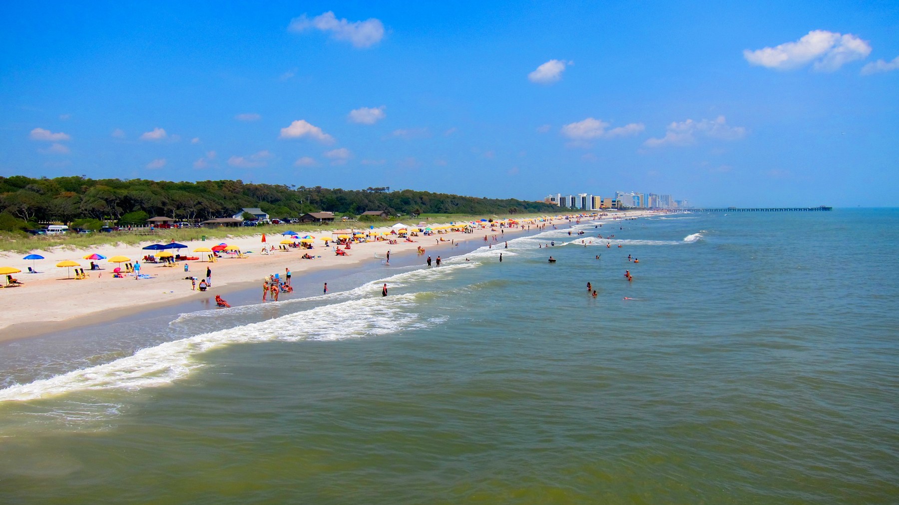 Myrtle Beach State Park sand and ocean viewed from its low pier; photographed August 8, 2011.